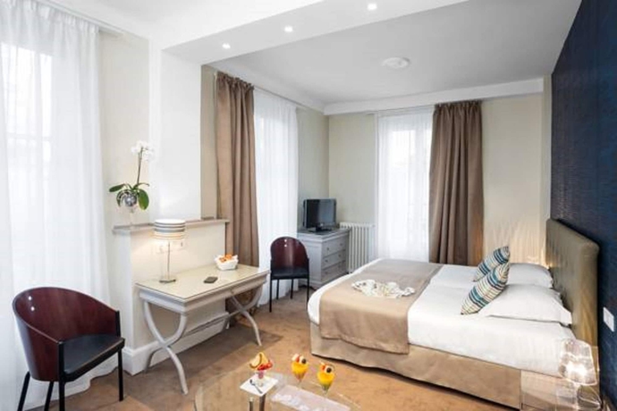 Imagen de la habitación del Hotel The Originals Boutique, Les Nations, Vichy. Foto 7