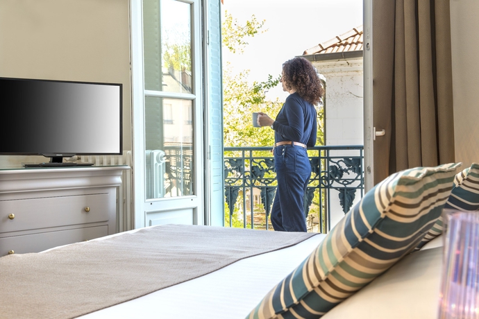 Imagen de la habitación del Hotel The Originals Boutique, Les Nations, Vichy. Foto 8