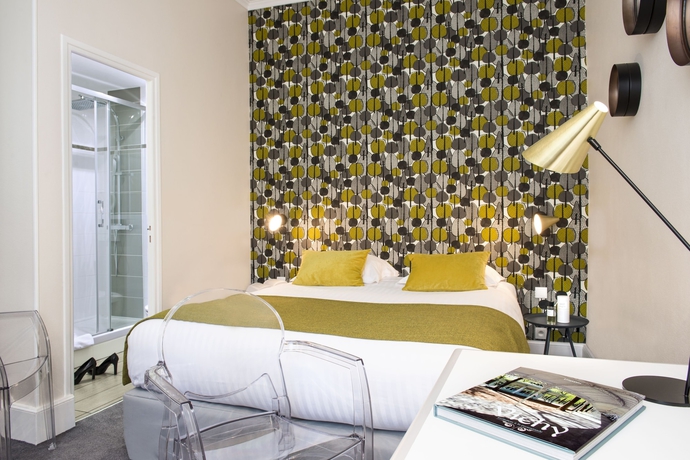 Imagen de la habitación del Hotel The Originals Boutique, Les Nations, Vichy. Foto 11