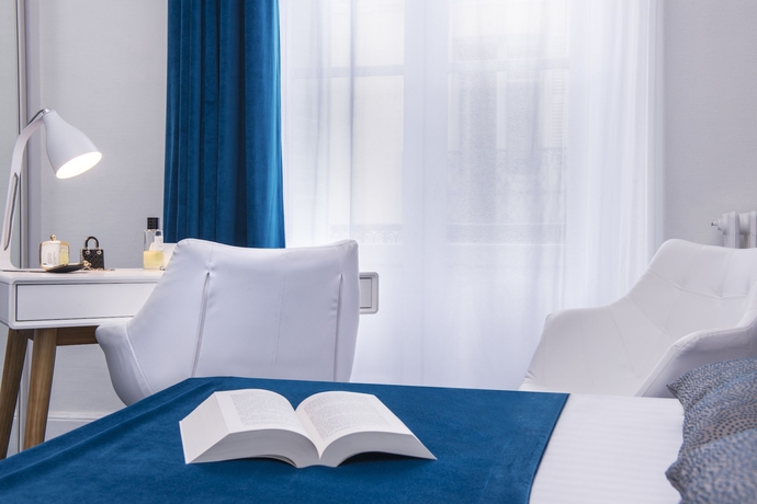 Imagen de la habitación del Hotel The Originals Boutique, Les Nations, Vichy. Foto 12