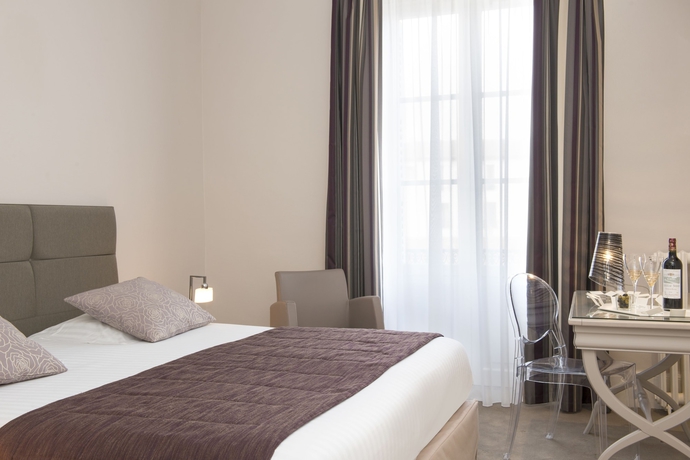 Imagen de la habitación del Hotel The Originals Boutique, Les Nations, Vichy. Foto 13