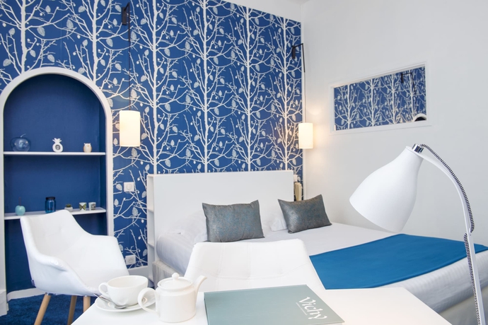 Imagen de la habitación del Hotel The Originals Boutique, Les Nations, Vichy. Foto 15