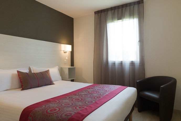 Imagen de la habitación del Hotel The Originals Boutique, Les Quatre Salines. Foto 5