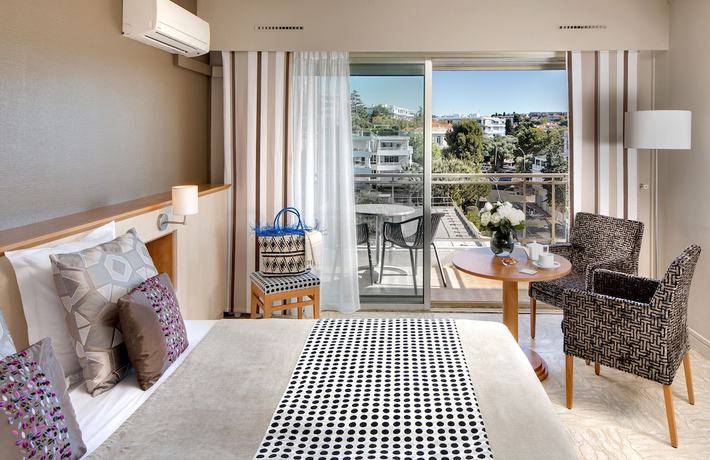 Imagen de la habitación del Hotel The Originals Boutique, Les Strélitzias. Foto 5