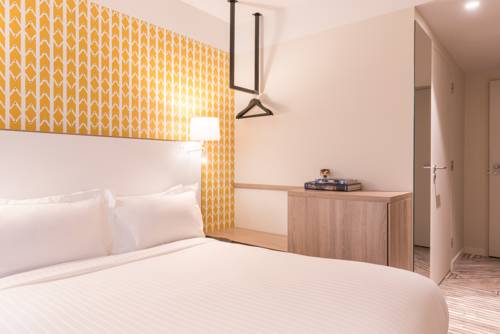 Imagen de la habitación del Hotel The Originals Boutique, Maison Montmartre, Paris Les Puces. Foto 13