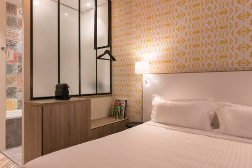 Imagen de la habitación del Hotel The Originals Boutique, Maison Montmartre, Paris Les Puces. Foto 16