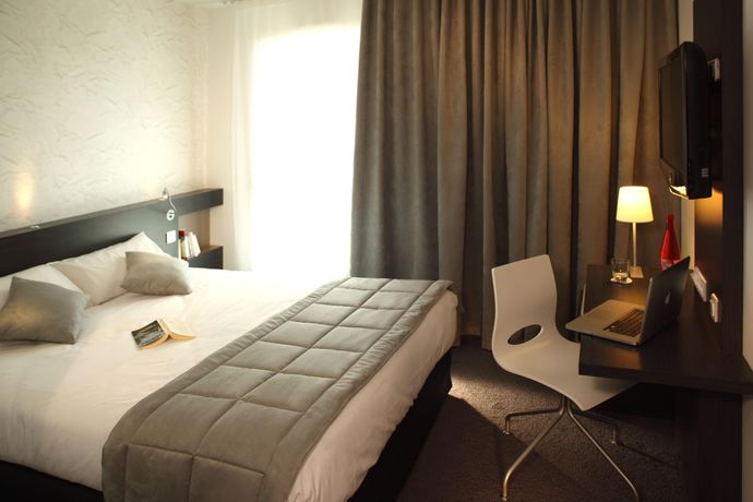 Imagen de la habitación del Hotel The Originals Boutique, Saint James Nantes. Foto 2