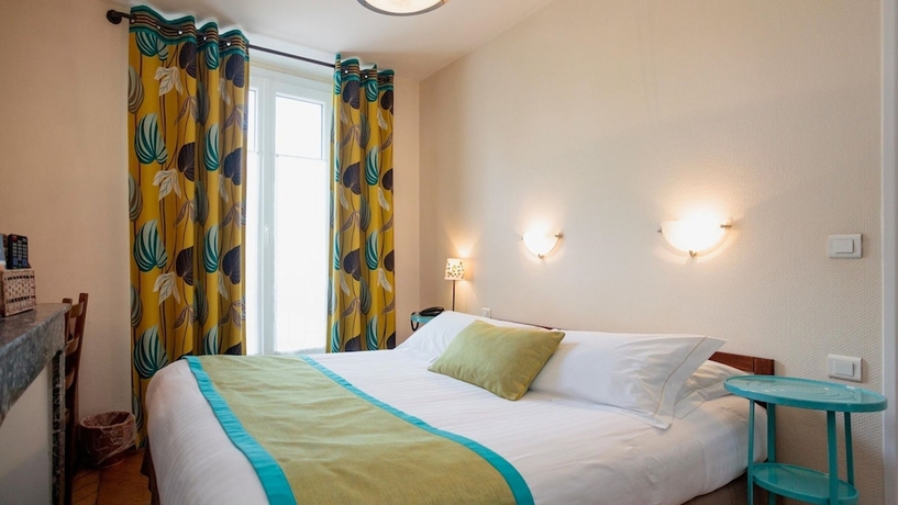 Imagen de la habitación del Hotel The Originals Boutique Victoria Fontainebleau. Foto 3