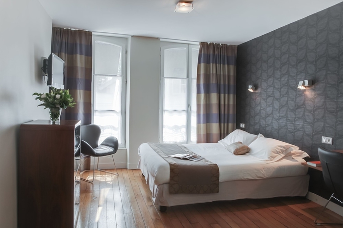 Imagen de la habitación del Hotel The Originals Boutique Victoria Fontainebleau. Foto 4