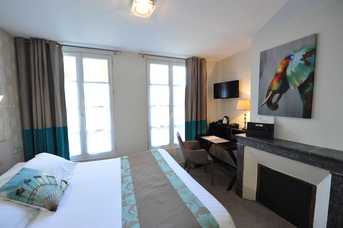 Imagen de la habitación del Hotel The Originals Boutique Victoria Fontainebleau. Foto 5