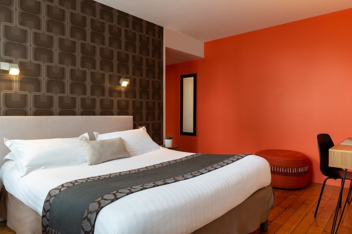 Imagen de la habitación del Hotel The Originals Boutique Victoria Fontainebleau. Foto 11