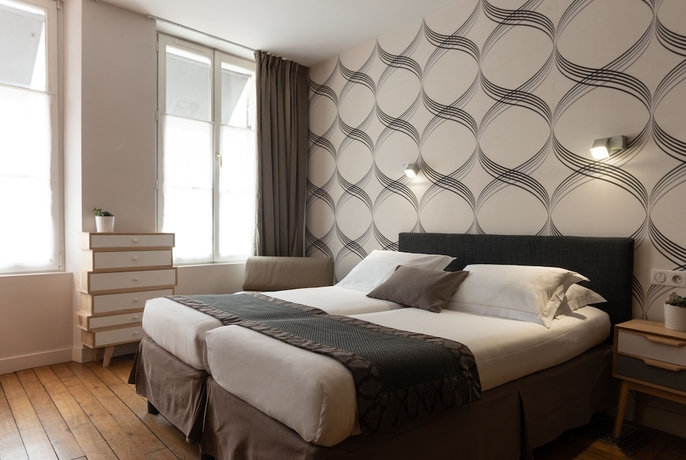 Imagen de la habitación del Hotel The Originals Boutique Victoria Fontainebleau. Foto 14