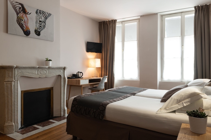 Imagen de la habitación del Hotel The Originals Boutique Victoria Fontainebleau. Foto 15