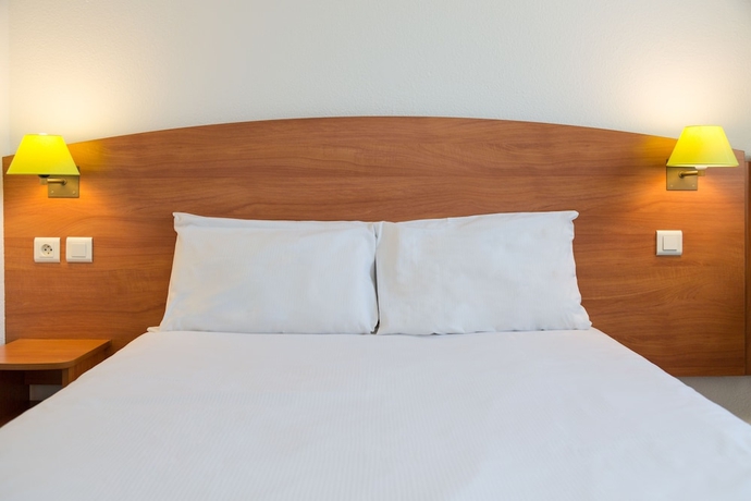 Imagen de la habitación del Hotel The Originals City, Agora. Foto 11