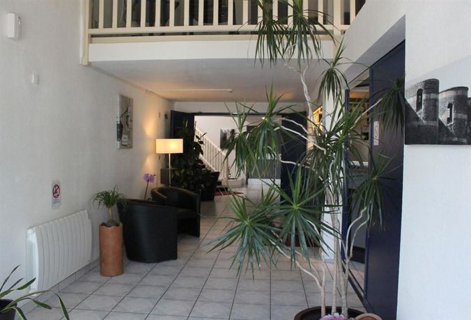 Imagen de los interiores del Hotel The Originals City, Angers Sud – Le Village 49. Foto 12