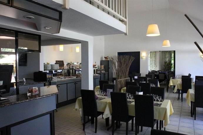 Imagen de los interiores del Hotel The Originals City, Angers Sud – Le Village 49. Foto 13