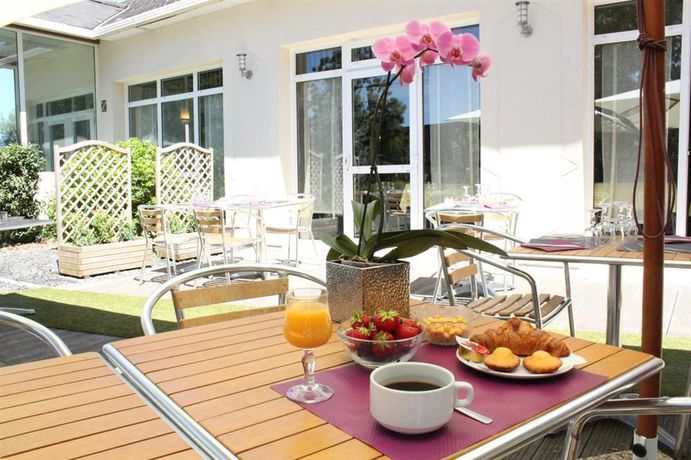 Imagen de los interiores del Hotel The Originals City, Angers Sud – Le Village 49. Foto 16