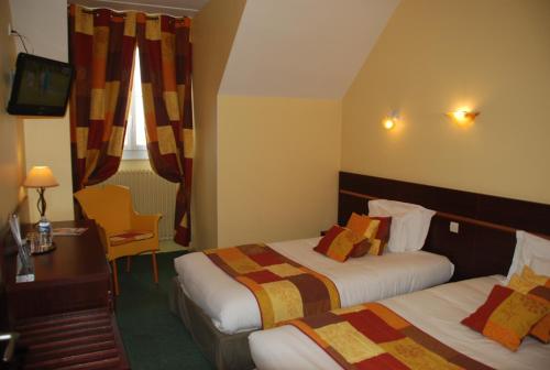 Imagen de la habitación del Hotel The Originals City, Cathédrale, Lisieux. Foto 9