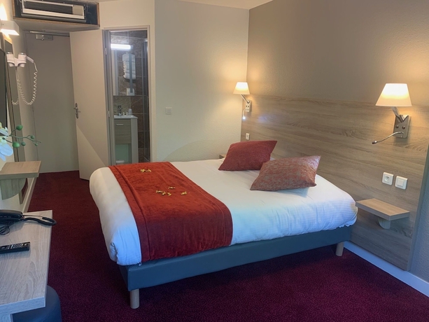 Imagen de la habitación del Hotel The Originals City, Costières, Nîmes. Foto 7