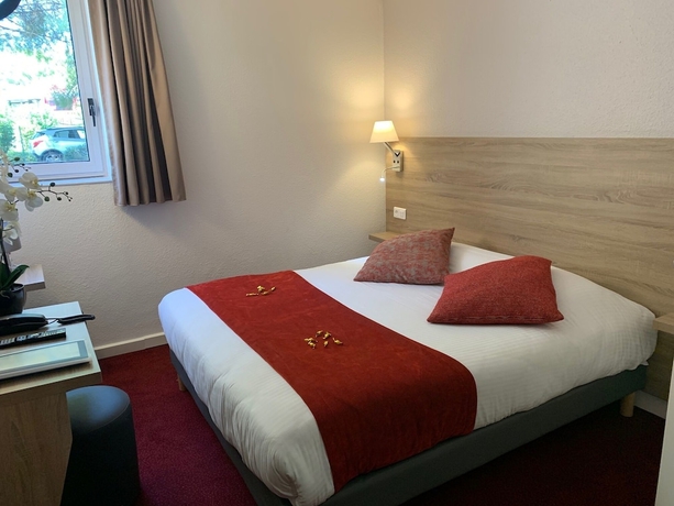 Imagen de la habitación del Hotel The Originals City, Costières, Nîmes. Foto 14