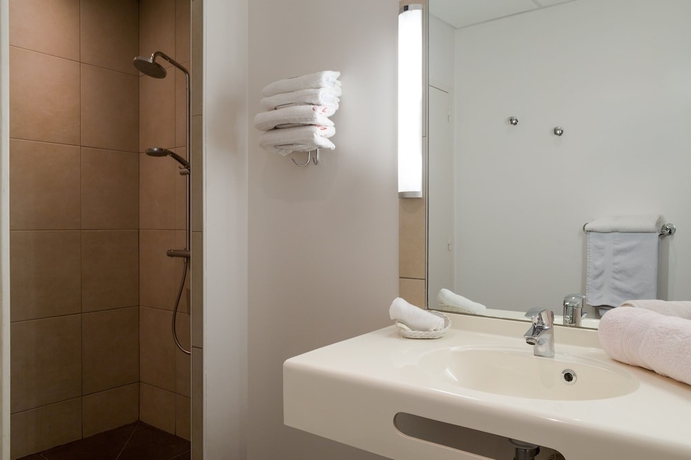 Imagen de la habitación del Hotel The Originals City, De France. Foto 13