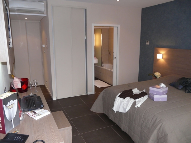 Imagen de la habitación del Hotel The Originals City, De France. Foto 14