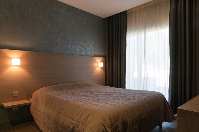 Imagen de la habitación del Hotel The Originals City, De France. Foto 17