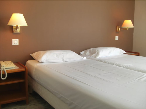 Imagen de la habitación del Hotel The Originals City, Frisia, Beaulieu-sur-mer. Foto 14