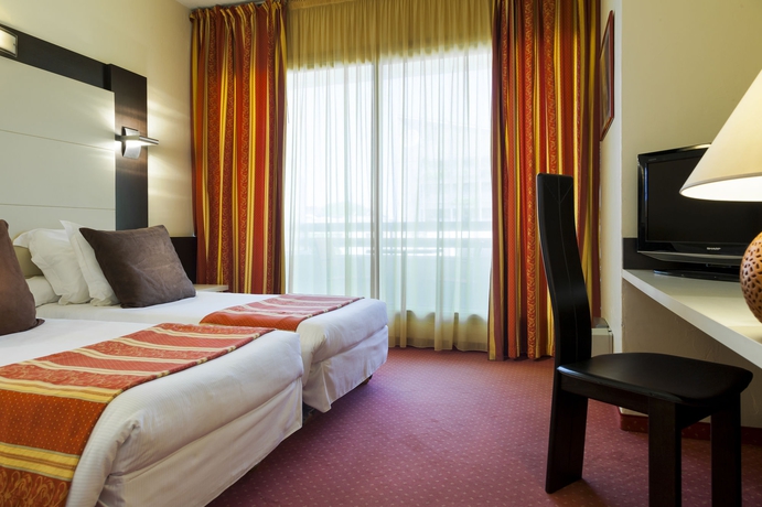 Imagen de la habitación del Hotel The Originals City, Galaxie, Nice Aéroport. Foto 12