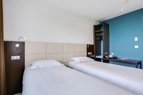 Imagen de la habitación del Hotel The Originals City, Hôtel Caen Mémorial. Foto 6