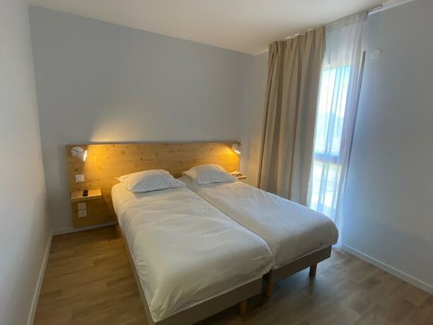 Imagen de la habitación del Hotel The Originals City, H&ocirc;tel Le Relais des Deux Mers, Marmande Sud. Foto 20