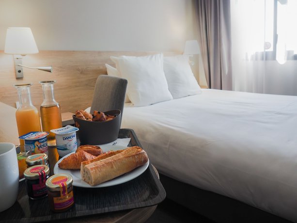 Imagen de la habitación del Hotel The Originals City, H&ocirc;tel de la Confluence. Foto 13