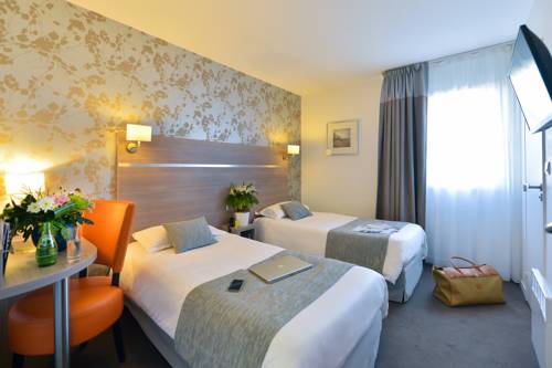 Imagen de la habitación del Hotel The Originals City, Le Beaujoire, Nantes. Foto 10