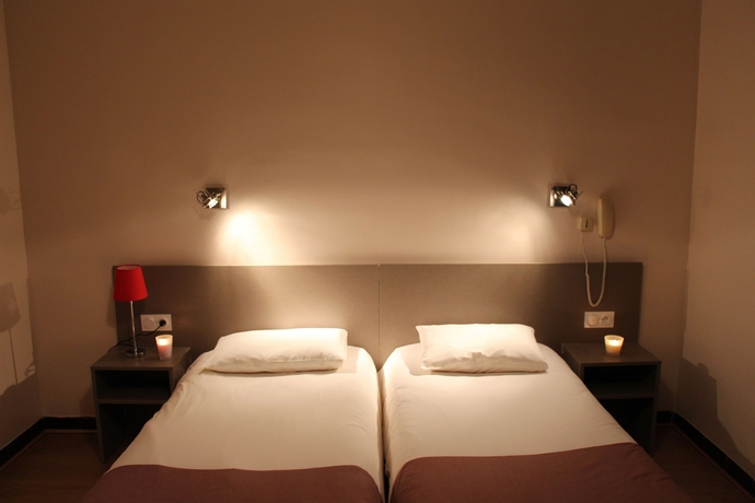 Imagen de la habitación del Hotel The Originals City, Mondial, Perpignan. Foto 3