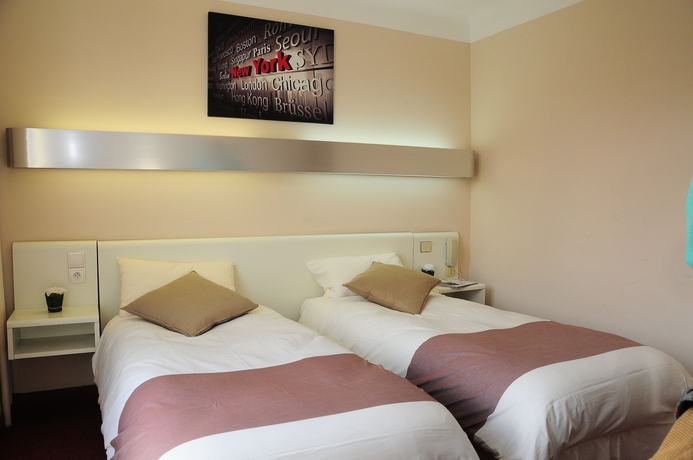 Imagen de la habitación del Hotel The Originals City, Mondial, Perpignan. Foto 7