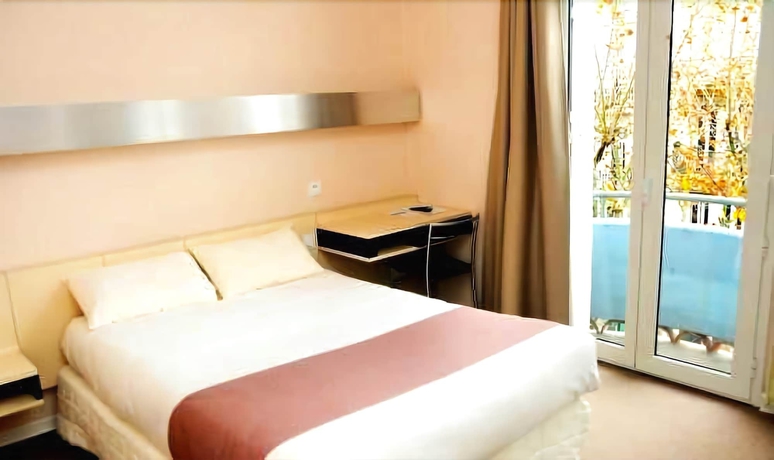 Imagen de la habitación del Hotel The Originals City, Mondial, Perpignan. Foto 8