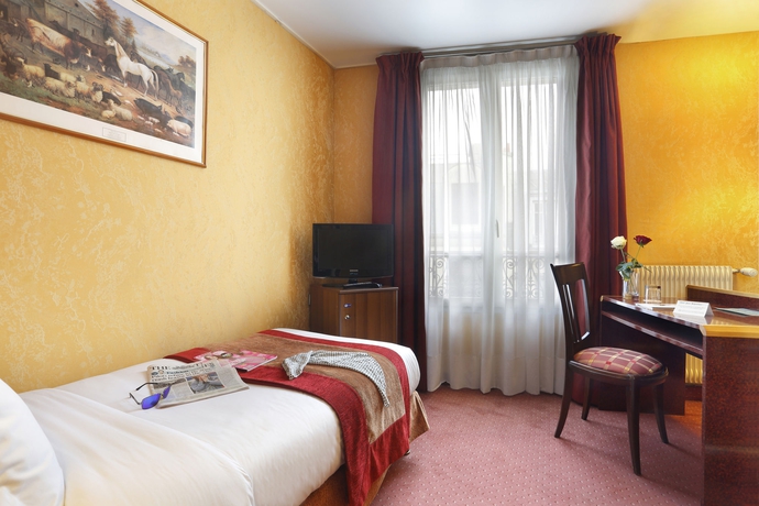 Imagen de la habitación del Hotel The Originals City Paix Republique. Foto 8