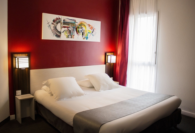 Imagen de la habitación del Hotel The Originals City, Pont Rouge, Carcassonne. Foto 8