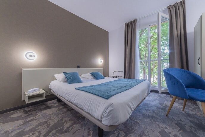 Imagen de la habitación del Hotel The Originals City, Relax'otel, Le Barcarès. Foto 18