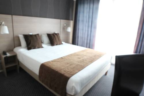 Imagen de la habitación del Hotel The Originals City, Villancourt. Foto 8