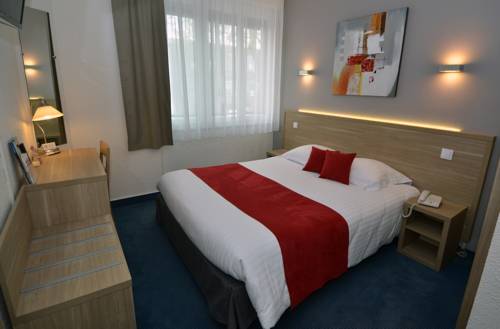 Imagen de la habitación del Hotel The Originals Les Oc&eacute;anes. Foto 7