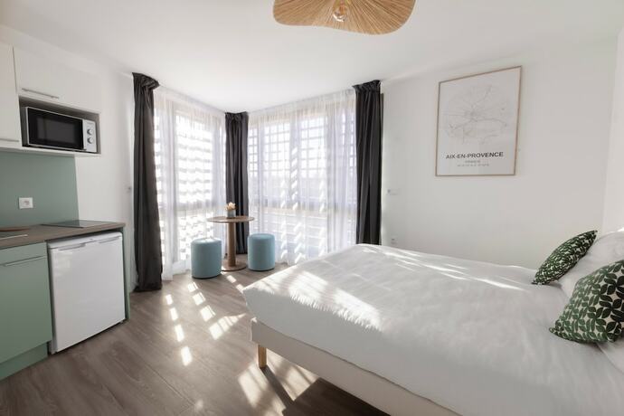 Imagen de la habitación del Hotel The Originals Résidence Aix Schuman. Foto 20