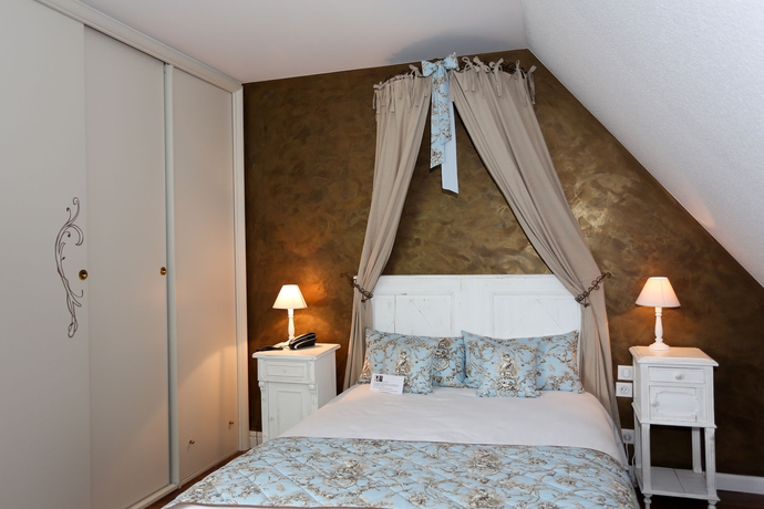 Imagen de la habitación del Hotel The Originals Relais, Le Verger Des Ch&acirc;teaux. Foto 5