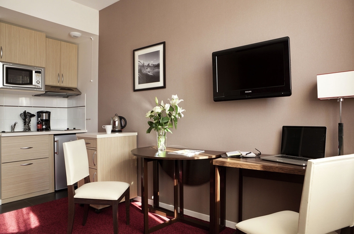 Imagen de los interiores del Hotel The Originals Residence, Kosy s Grenoble Les Cèdres. Foto 13