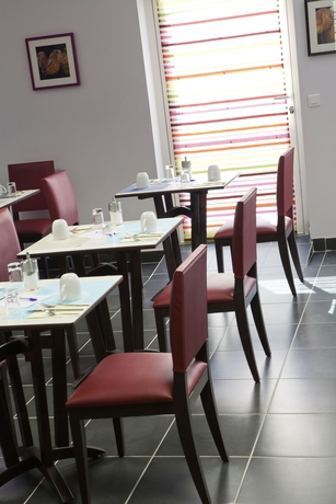 Imagen del bar/restaurante del Hotel The Originals Residence, Kosy s Grenoble Les Cèdres. Foto 4