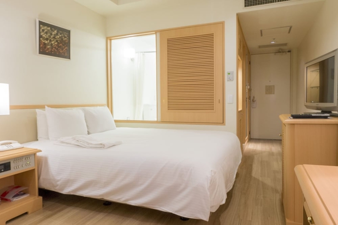 Imagen de la habitación del Hotel The Orion Naha. Foto 11