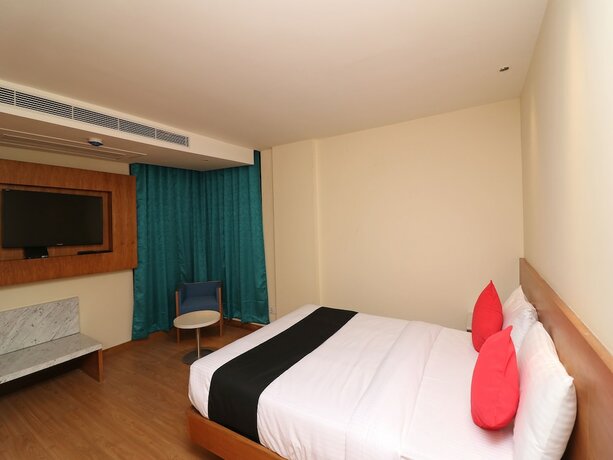 Imagen de la habitación del Hotel The Orion Plaza. Foto 16