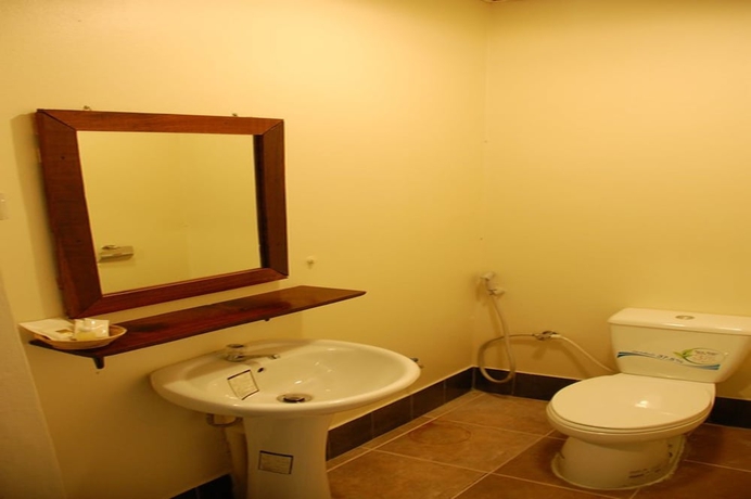 Imagen de la habitación del Hotel The Outside Inn. Foto 16