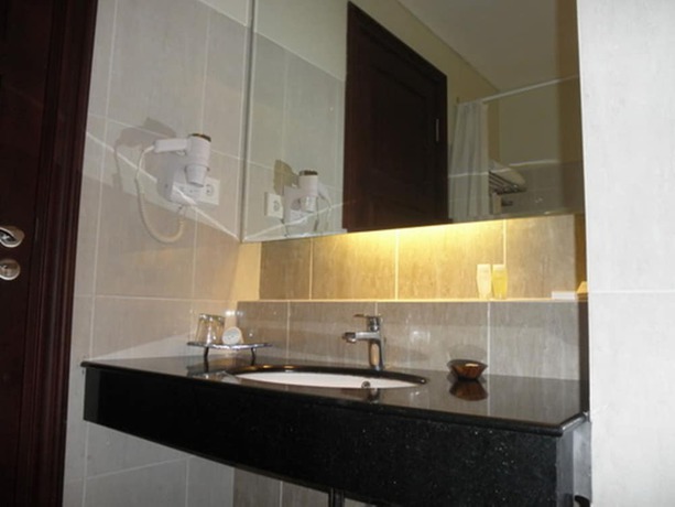 Imagen de la habitación del Hotel The Oxalis Regency Magelang. Foto 11