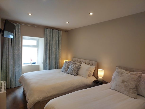 Imagen de la habitación del Hotel The Oyster House. Foto 16